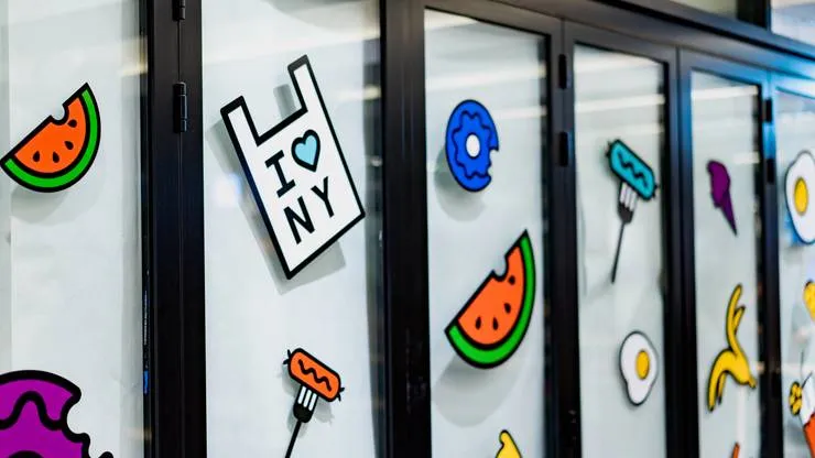 Doors with stickers on them in Columbus Circle, New York
