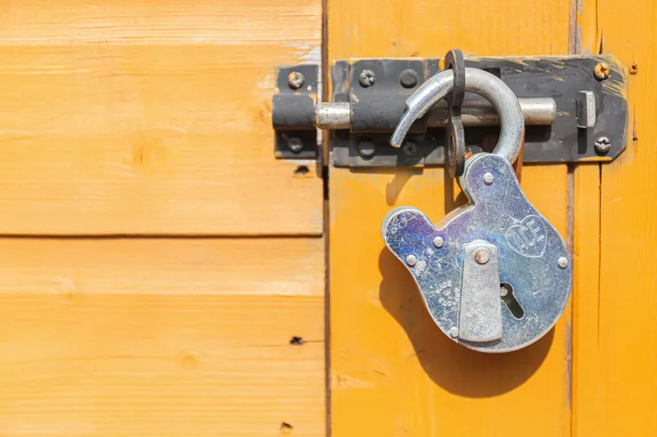 A broken lock, symbolising weak authentication/security.